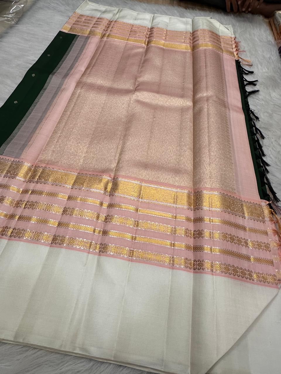 Forest Green Pure Silk Kanchipuram Varisaipet saree with Petal Pink Ivory and classic gold zari border