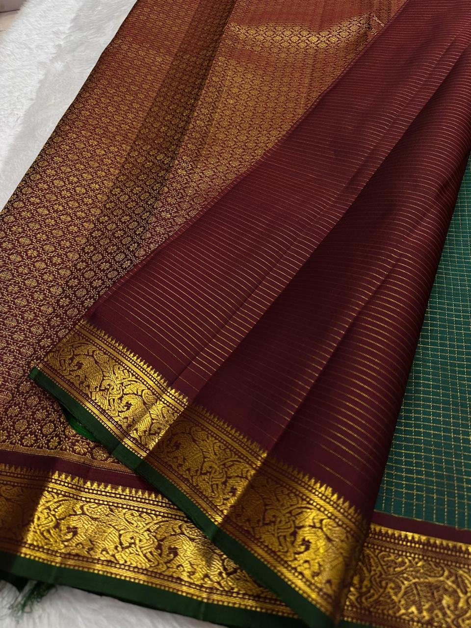Forest Green Pure Silk Kanchipuram Zari Kattam saree with Yaanai gold zari border