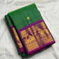 Gold zari kamalam butta on forest green zari kattam KanchiPattu silk saree body — Idam Living