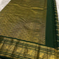 Deep Forest Green Pure Silk Kanchi Pattu saree with intricate warm-gold zari detailing