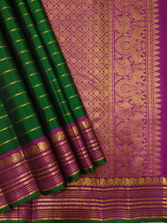 Forest green pure silk Kanchipuram saree with Veldhari body and magenta Yaanai border — body detail