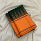 Gold zari detail of Kanchi Kattam checkered grid on forest green Kanjipuram pure silk saree