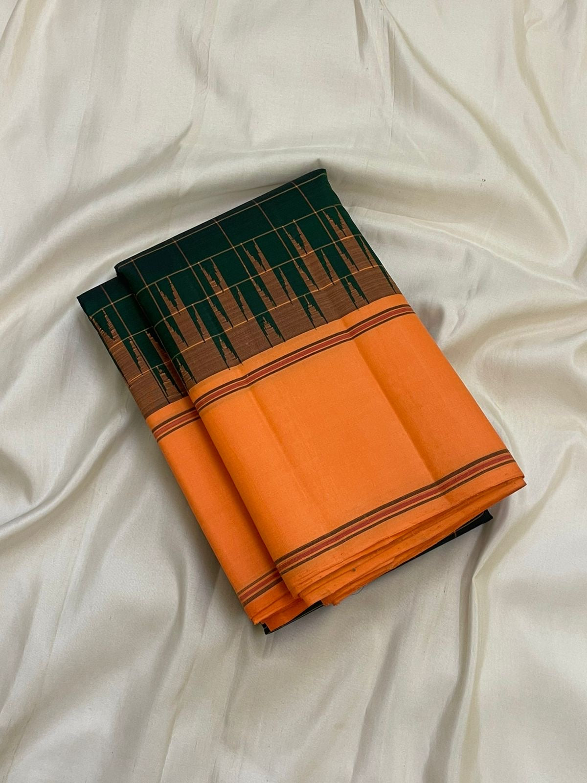 Gold zari detail of Kanchi Kattam checkered grid on forest green Kanjipuram pure silk saree