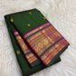 Rudraksham rows and peacock zari ornaments on the contrasting border of this Varisaipet saree