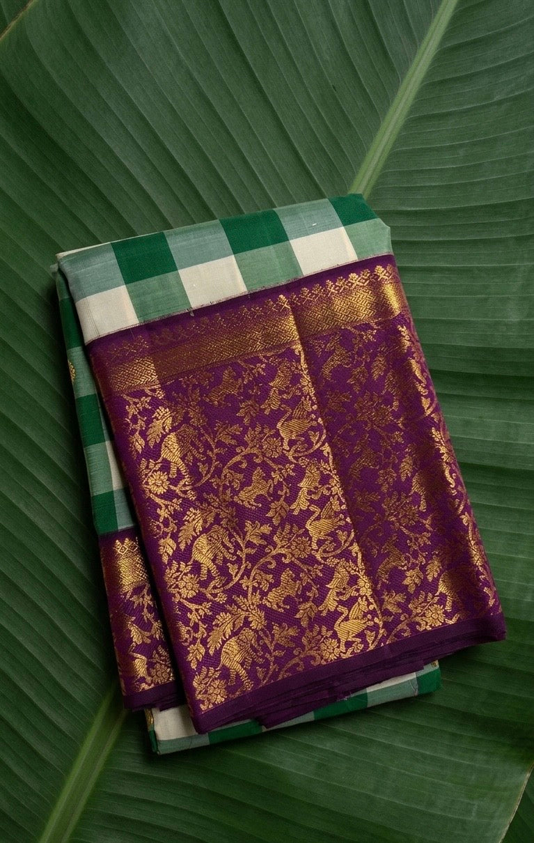 Fresh betel green and ivory Pure Kanchipuram silk saree with rich plum antique gold zari pallu
