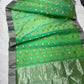 Repeating silver buttas on green Chanderi