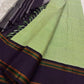 Pallu view of the fresh green Kanjivaram saree with simple linear detailing