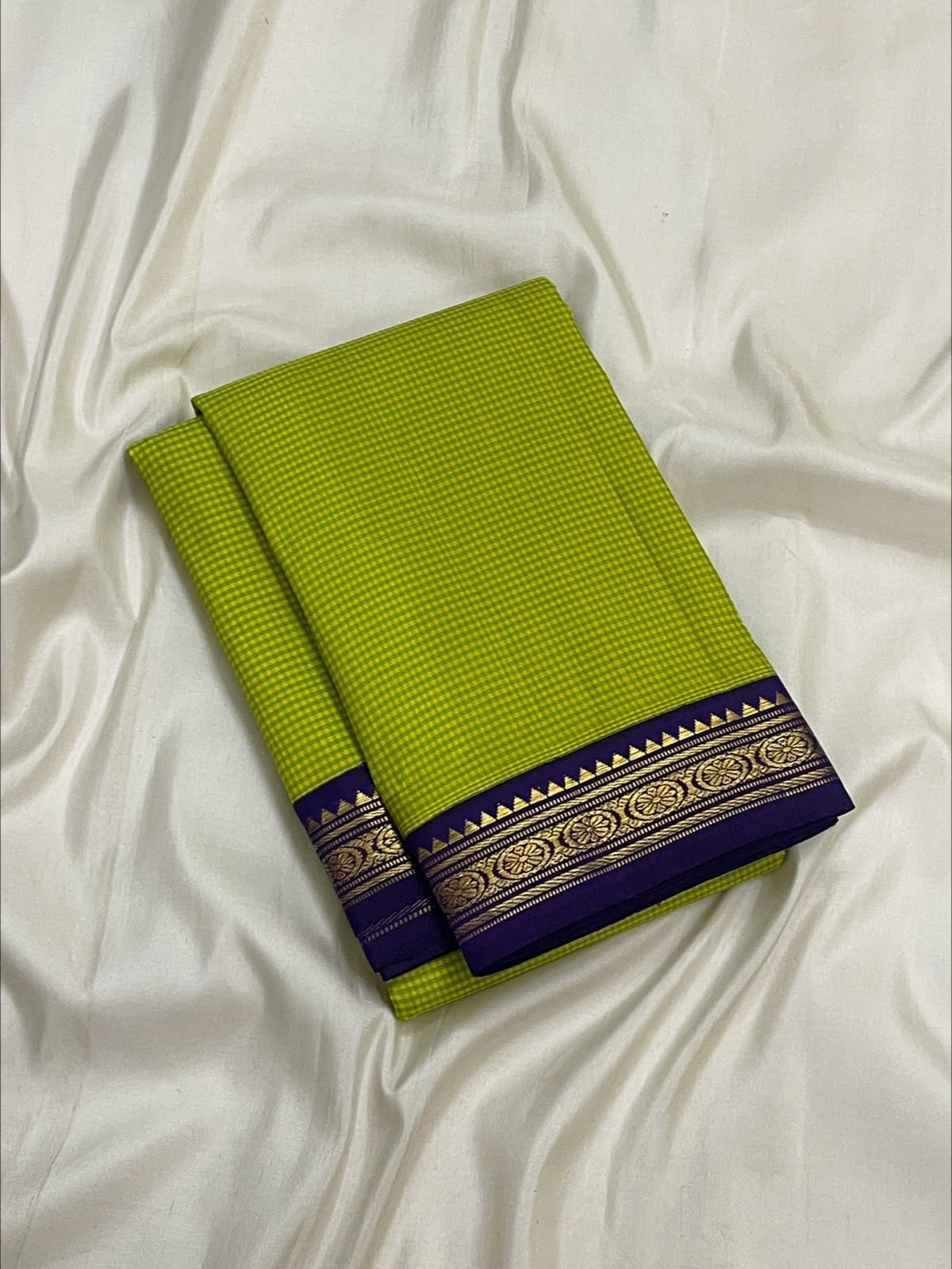 Fresh green Podi Kattam Pure Silk Kanchipuram saree with deep purple and gold zari border