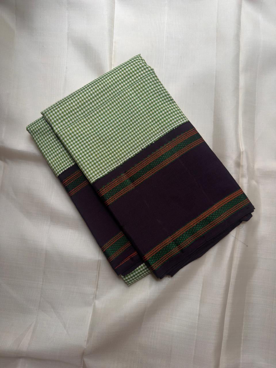 Podi kattam small check body on a fresh green Kanchi Kattam saree
