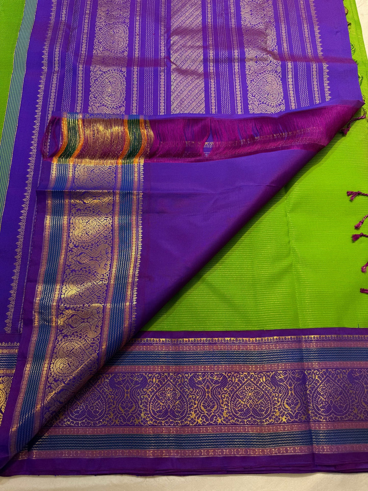Thulir Pachai fresh green Pure Silk Kanchipuram saree draped