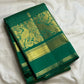 Green Kanchipuram silk with Chedi buttas and Mayil border