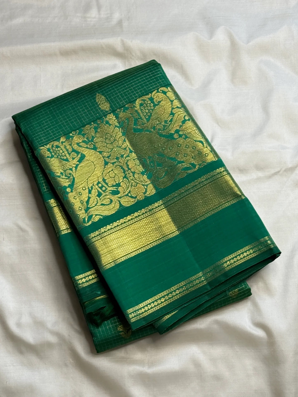 Green Kanchipuram silk with Chedi buttas and Mayil border