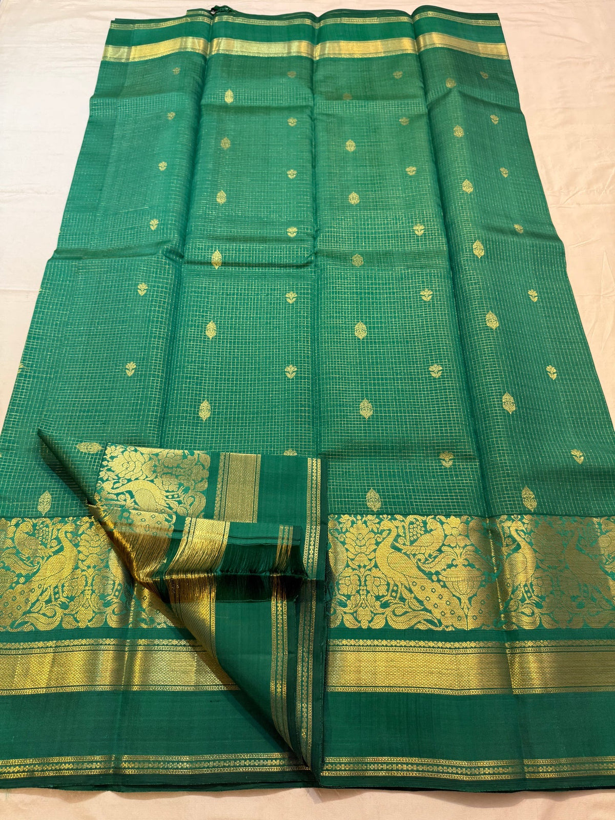 Fine gold Zari Kattam grid on fresh green silk