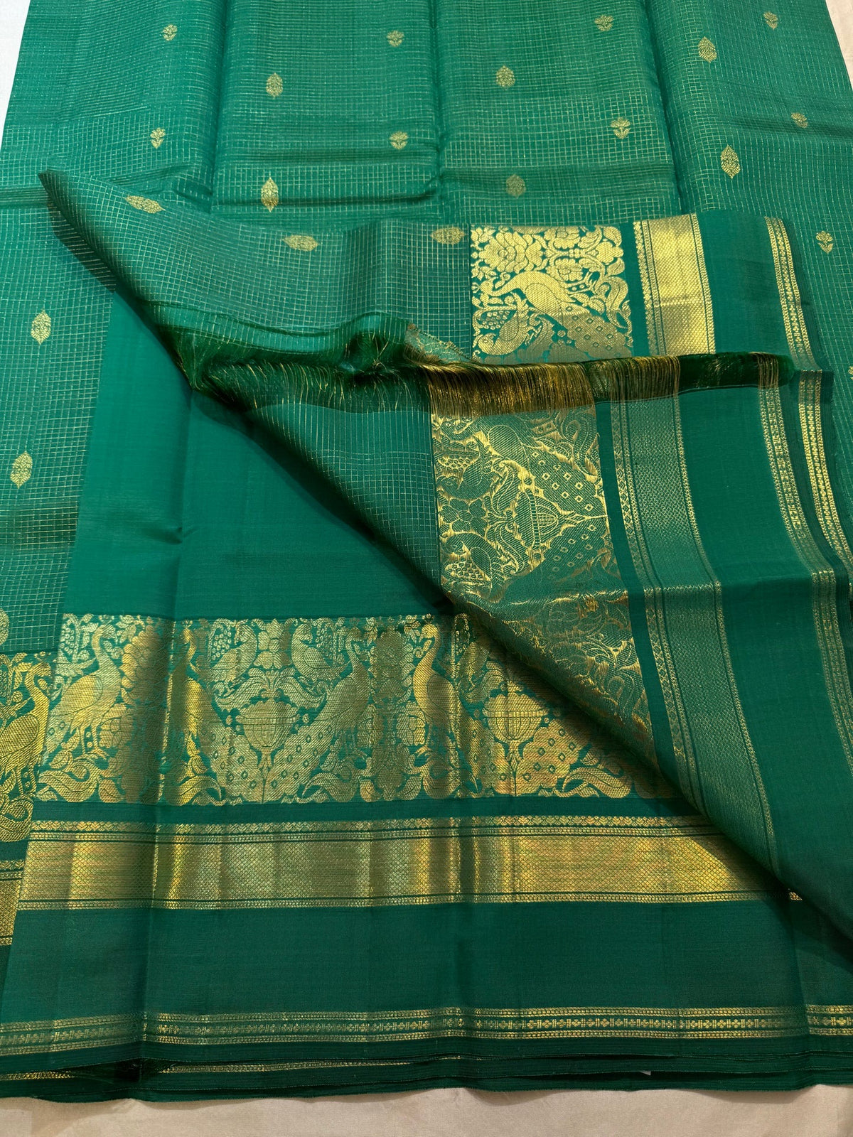 Mayil peacock zari border on fresh green pure silk
