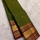 Fresh Green Handwoven Pure Silk Kanchipuram Zari Kattam Saree with Ruby Red Border – silk fabric close-up