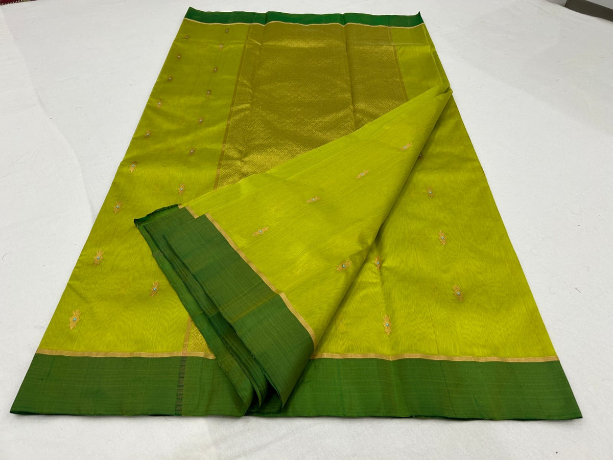 Lime Green handloom Pattu Silk Chanderi saree draped to show the fresh leaf-green tone and silk lustre