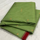 Folded green Chanderi Katan Silk saree with delicate gold woven buttas and deep red border