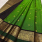 Fresh Leaf Green Pure Silk Kanchipuram Butta saree with a dark Mayil gold-zari border.