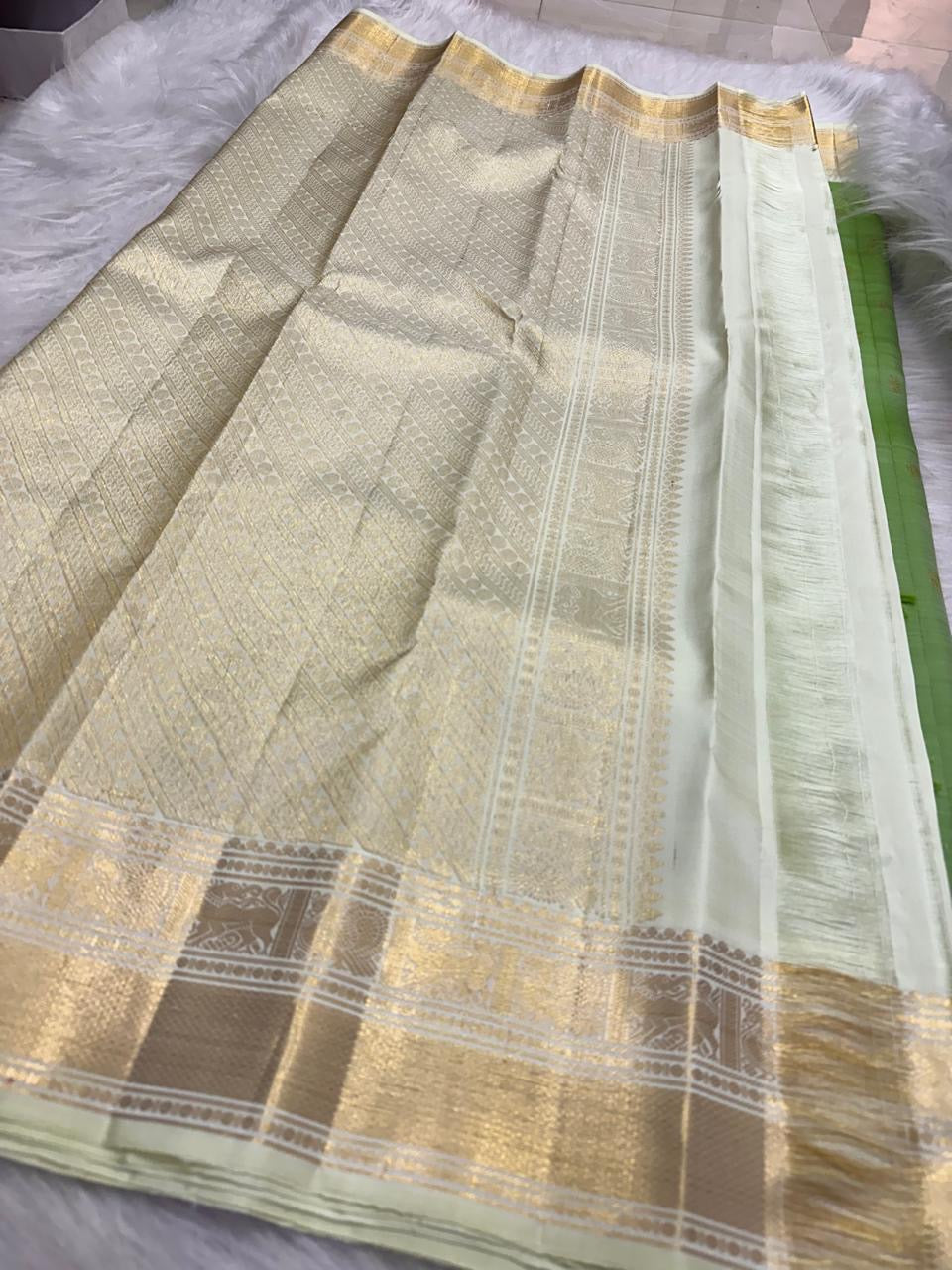 Fresh Leaf Green Kanchi Pattu Saree — pallu detail with silver-grey and gold zari work