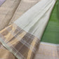 Fresh Leaf Green Kanchi Pattu Saree — body close-up showing gold zari buttas