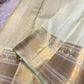 Warm Ivory gold zari Mayil border on green Pure Silk Kanchipuram saree