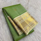 Fresh Leaf Green Pure Silk Kanchipuram Korvai saree with Warm Ivory gold zari Mayil border