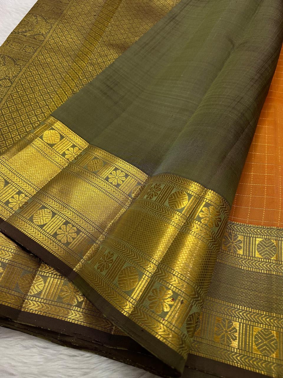 Fine pearl-like zari checks on mango-yellow pure silk Kanjeevaram saree