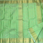 Fresh Pistachio Green Kancheepuram silk saree, body weave texture close-up — Idam Living