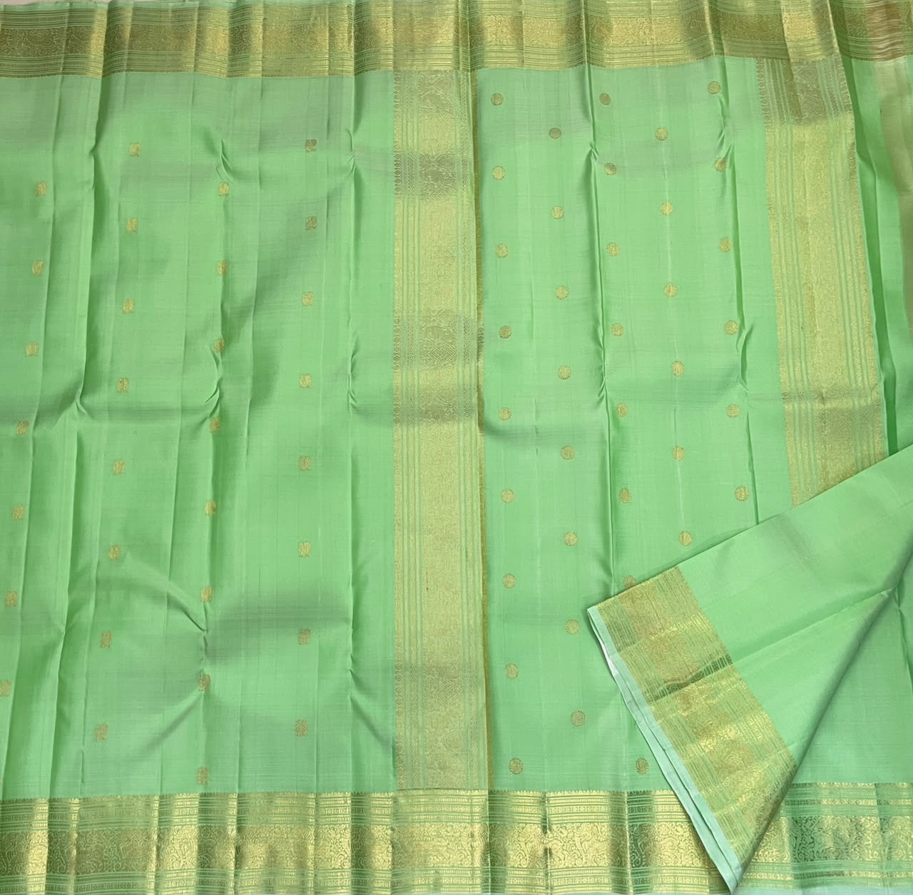 Fresh Pistachio Green Kancheepuram silk saree, body weave texture close-up — Idam Living