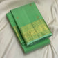 Fresh Pistachio Green Kancheepuram silk saree draped, full length view — Idam Living