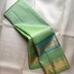 Fresh Pistachio Green Kanchi Pattu silk saree, gold zari butta motif close-up — Idam Living