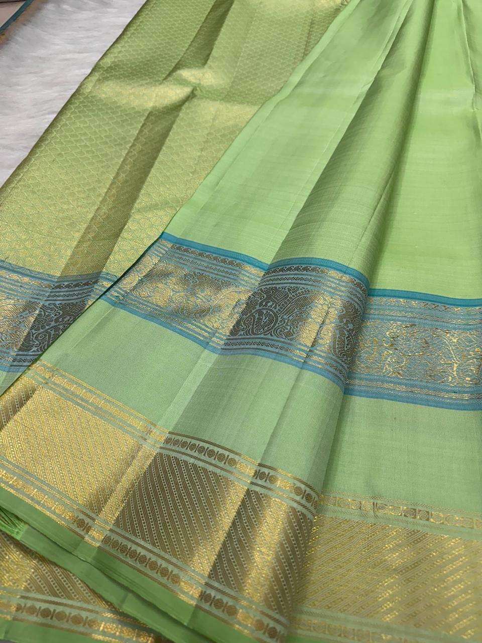 Fresh Pistachio Green Kanchi Pattu silk saree — full front view, rettapet weave — Idam Living