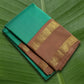 Kanchipuram silk saree in fresh turquoise green with sandal brown border Korvai Rettapet weave folded view