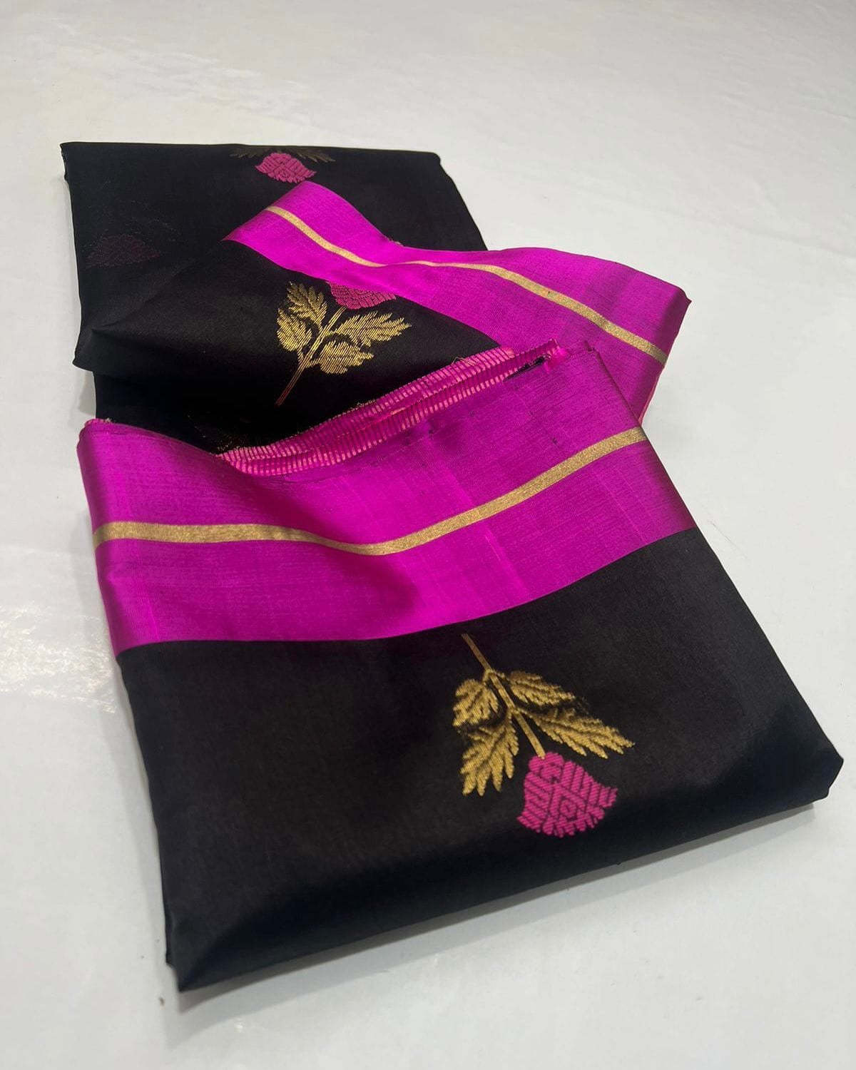 Fuchsia pink floral buttas with gold leaves woven on black Chanderi silk