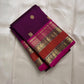 Gold-rich pallu on the fuchsia pink Kanchipuram rettapet saree.