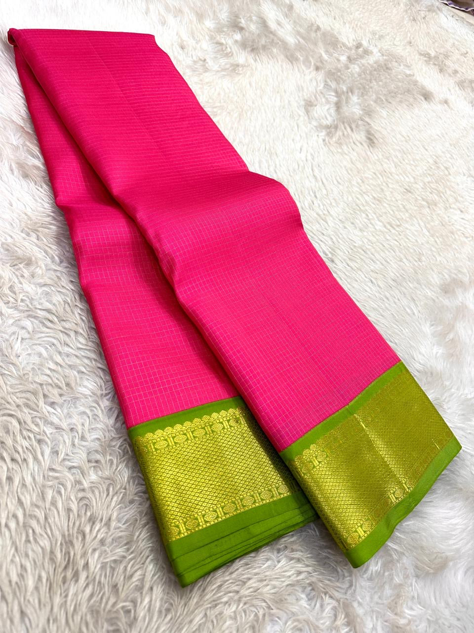 Fuchsia pink Zari Kattam Kancheepuram saree with green border