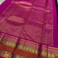 Border detail showing slim green highlight bands and gold zari.