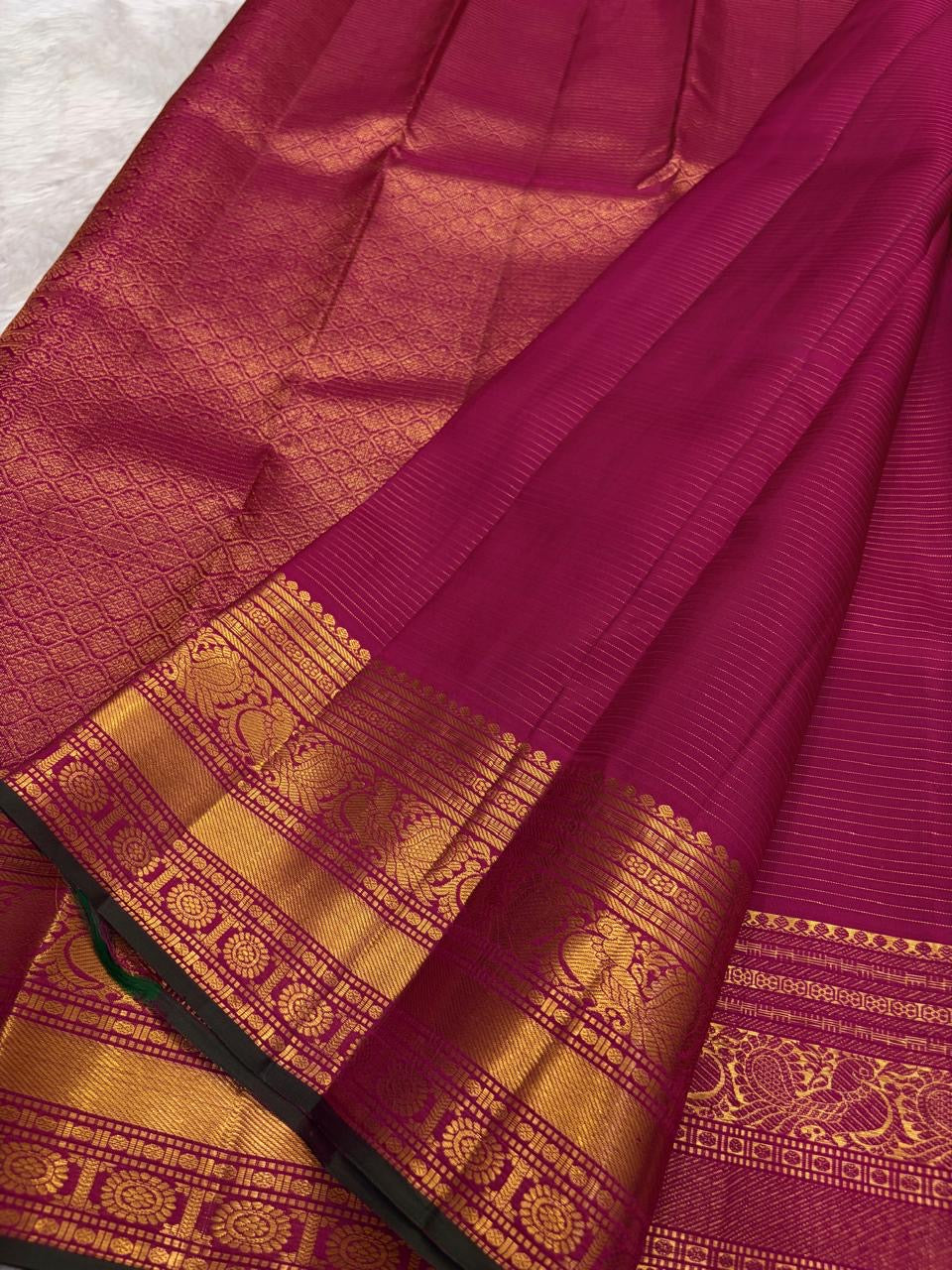 Fuchsia Pink Handwoven Pure Silk Kanchipuram Saree with Zari Kattam and Mayil Butta Rudhraksham Border