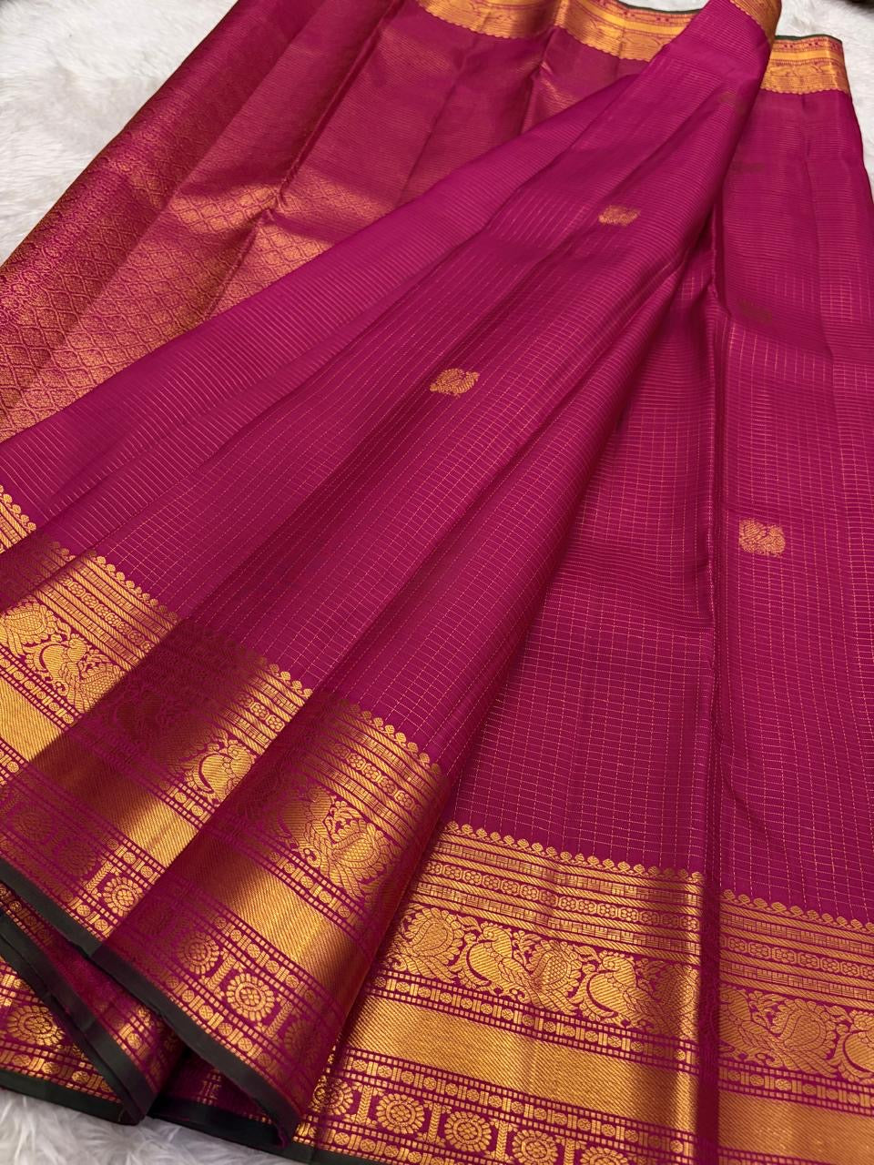 Fuchsia Pink Handwoven Pure Silk Kanchipuram Saree with Zari Kattam and Mayil Butta Rudhraksham Border