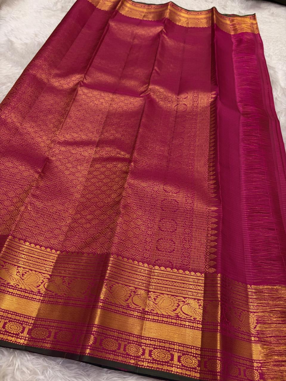 Fuchsia Pink Handwoven Pure Silk Kanchipuram Saree with Zari Kattam and Mayil Butta Rudhraksham Border