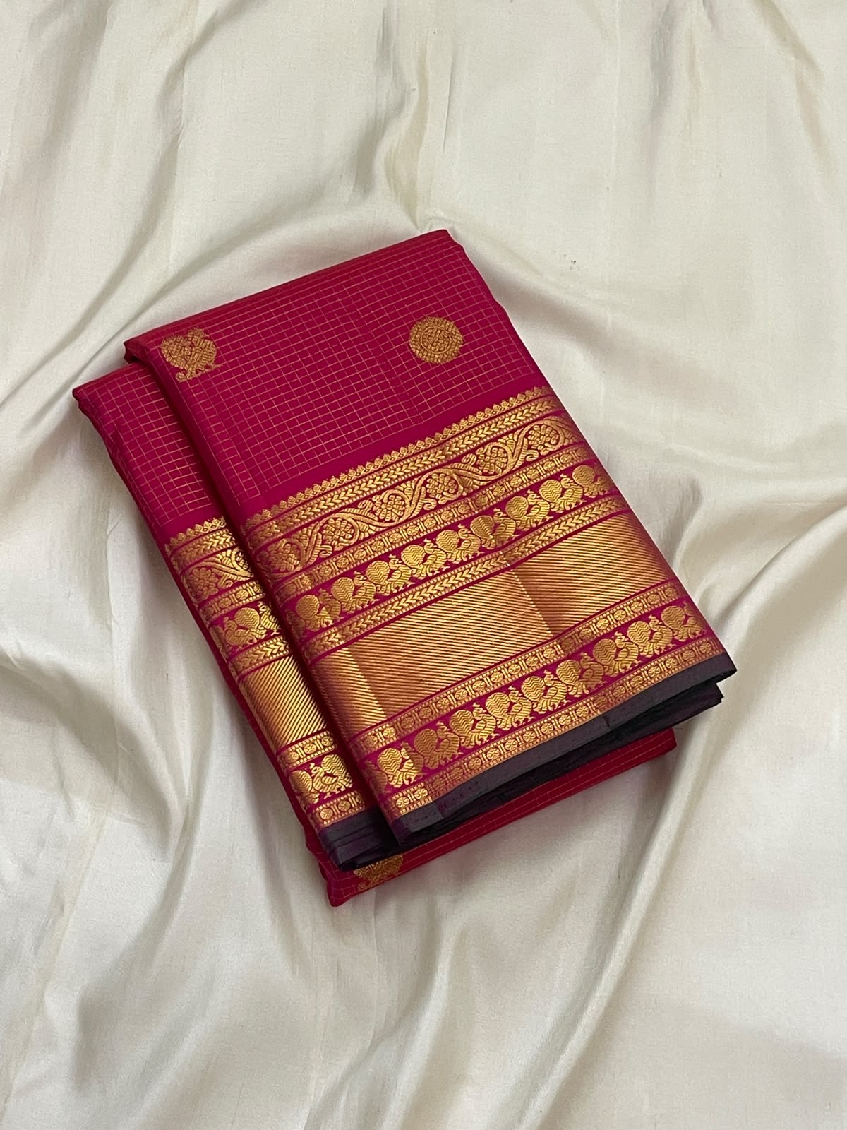 Fuchsia pink Kanchipuram silk saree, Zari Kattam grid folded view