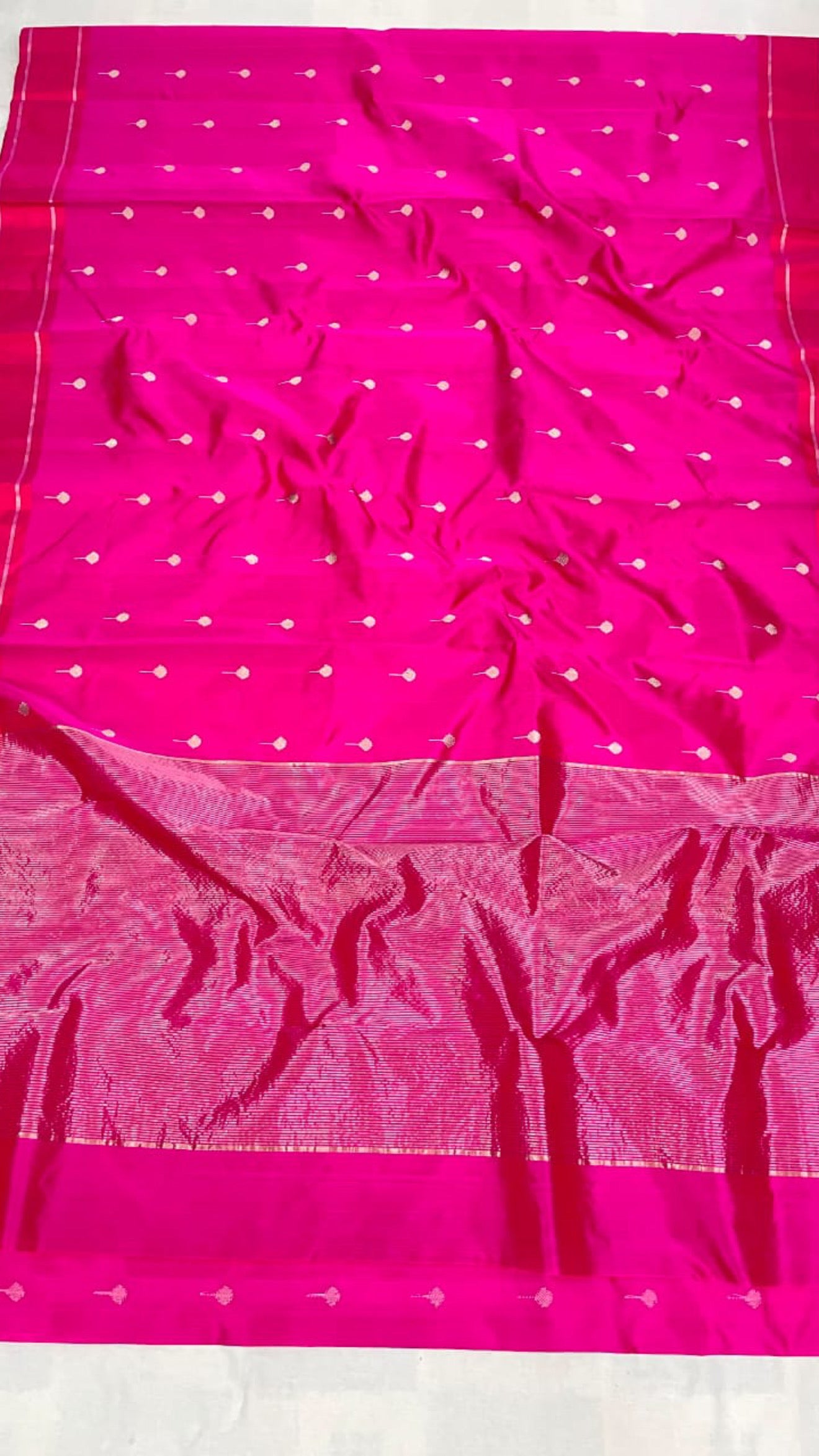 Fuchsia pink Pure Silk Chanderi saree with floral buttas across the body