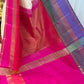 Close pleats of ivory saree with red-hot pink contrast border and zari woven edging, shown beside pink pallu.
