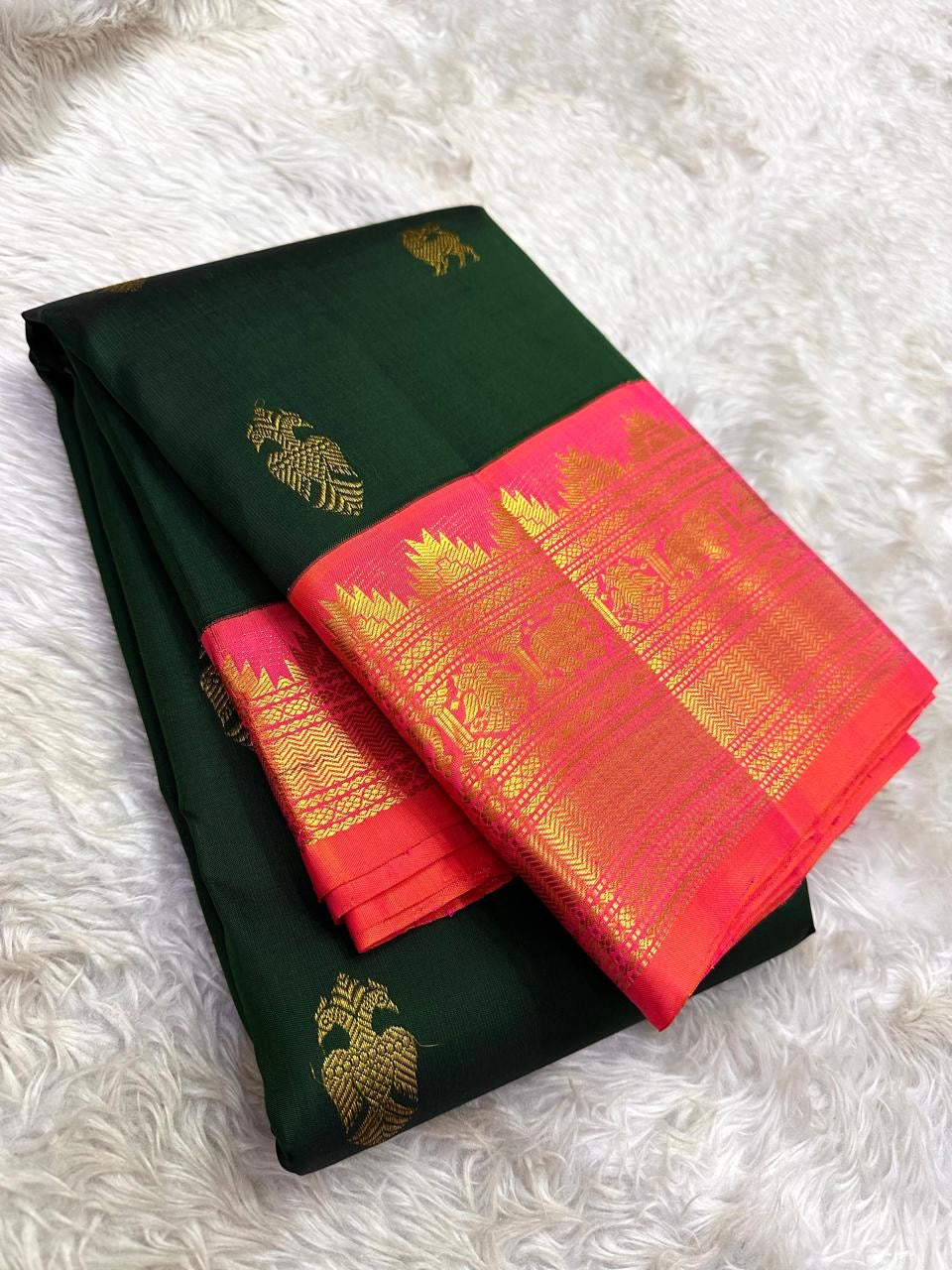 Deep Forest Green Handwoven Pure Silk Kanjeevaram Saree with Gandaberunda Zari Buttas and Rani Pink Border