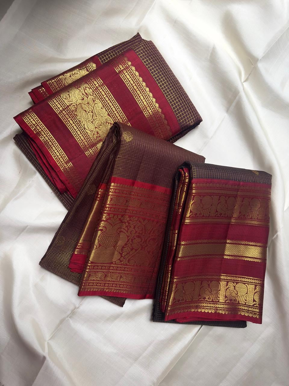 Deep Coffee Brown Pure Silk Kanchipuram Zari Kattam saree with Arakku Red Gandaberunda gold zari border.