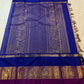 Gold beige Korvai KanchiPattu silk saree with royal blue border and purple peacock pallu — Idam Living