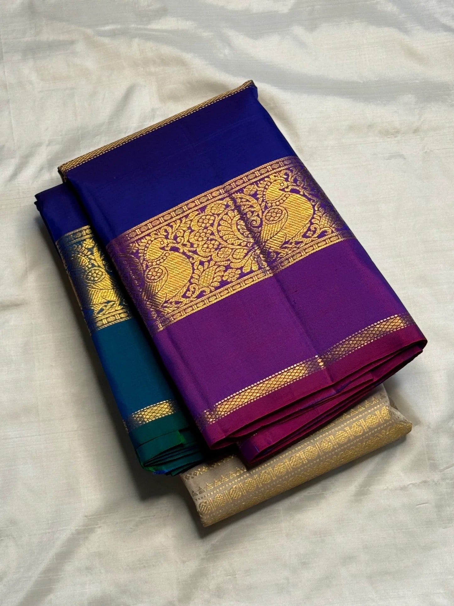 Royal blue Korvai border detail on gold beige KanchiPattu silk saree