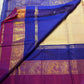 Purple grand pallu with gold zari peacock motifs on KanchiPattu silk saree