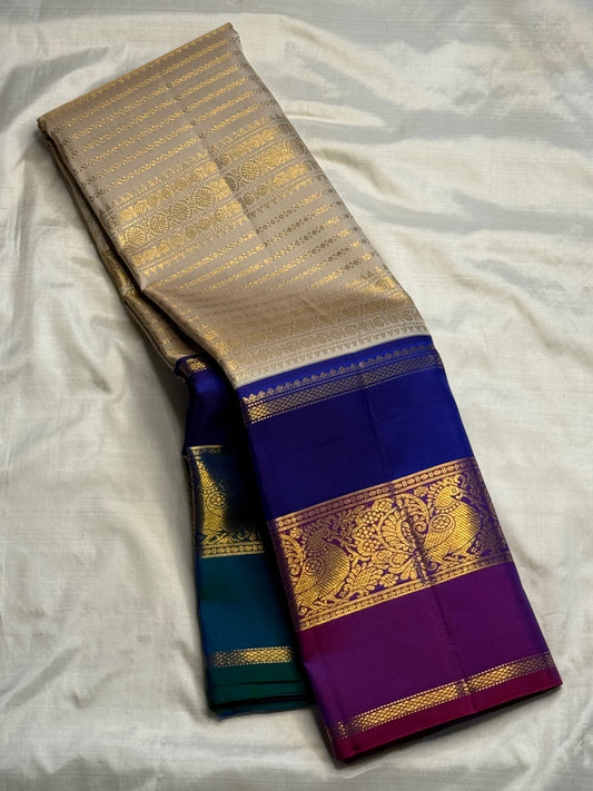 Gold beige Korvai KanchiPattu silk saree folded, full view
