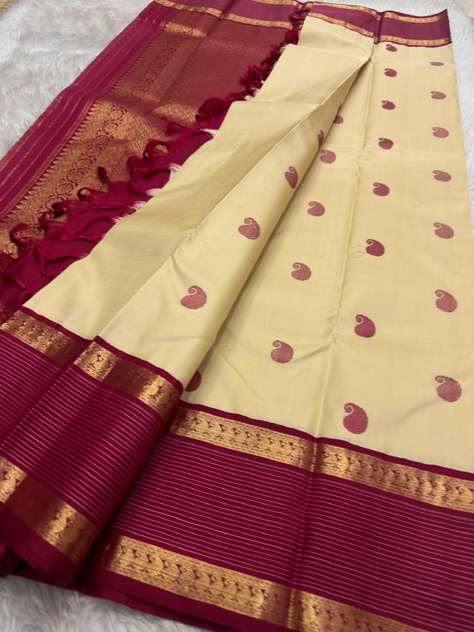 Gold beige KanchiPattu silk saree folded, full view